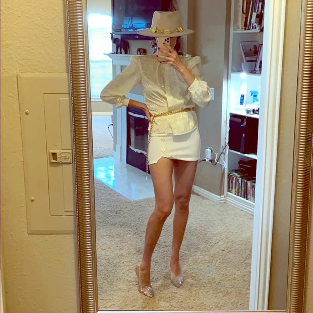 Vintage Blouse $90, mini skirt $50,